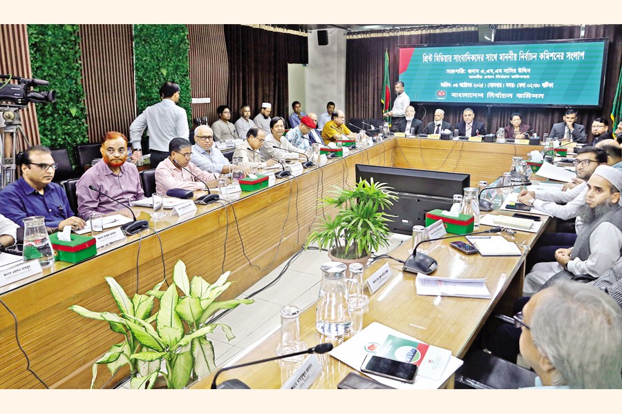 The Election Commission’s dialogue with the top-level representatives of print and electronic media in progress at the Nirbachan Bhaban in the city's Agargaon area on Monday. — FE Photo