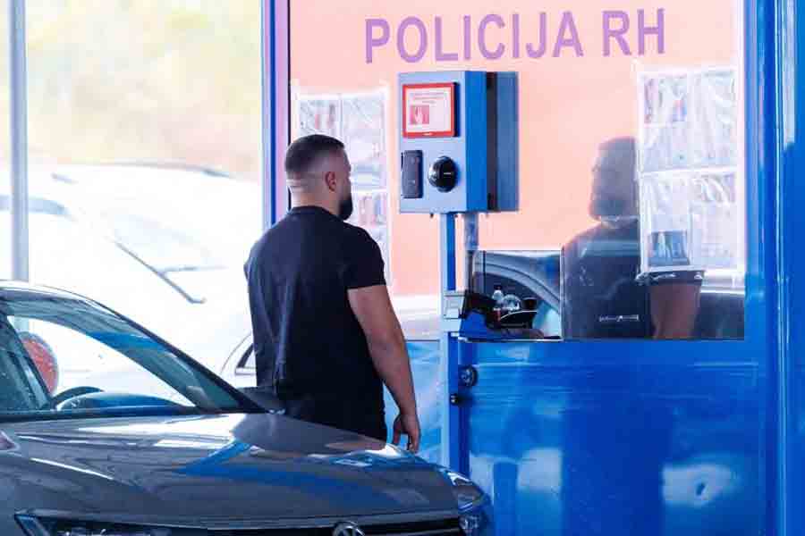 A man undergoes registration under the Entry/Exit System (EES), which requires all non-EU citizens to provide personal details, including fingerprints and facial images, upon their first entry into the Schengen area, at the Bajakovo border crossing in Croatia, Oct 12, 2025.