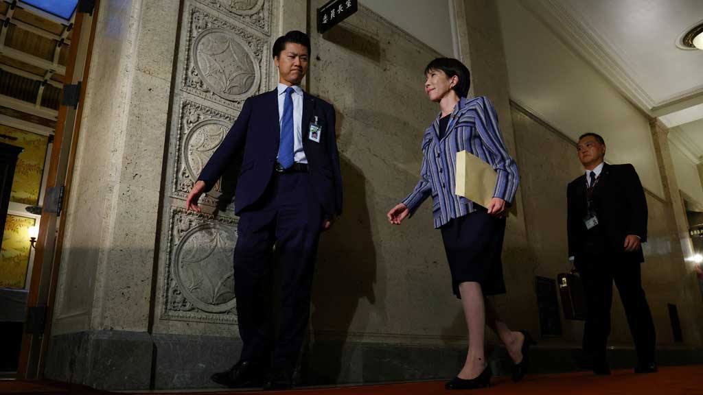 Leader of Japan's ruling Liberal Democratic Party (LDP) Sanae Takaichi enters a room to meet Japan Innovation Party's co-leader Fumitake Fujita (not in the photo) at Japan's National Diet Building in Tokyo, Japan, Oct 17, 2025. REUTERS