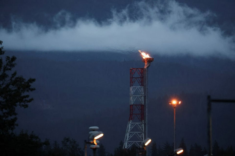 LNG Canada's flare stack burns at its LNG (liquid natural gas) export facility on Canada's Pacific coast in Kitimat, British Columbia, Canada August 19, 2025.