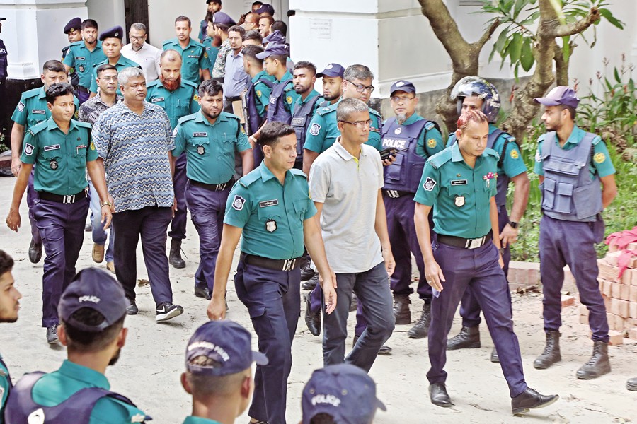 Fifteen army officers accused of crimes against humanity are being taken to the Dhaka Cantonment sub-jail after they were produced before the International Crimes Tribunal on Wednesday. — FE Photo by Shafiqul Alam