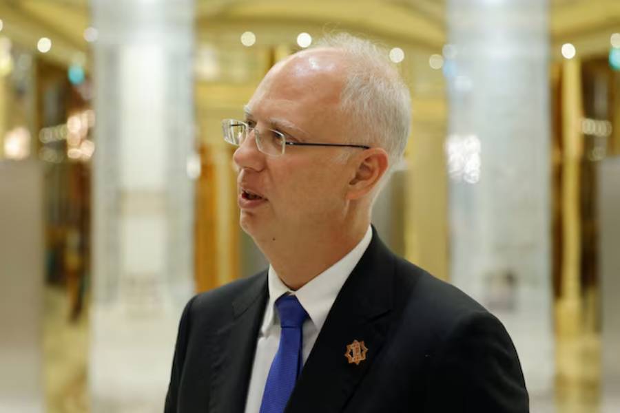 The head of Russia's sovereign wealth fund Kirill Dmitriev speaks to members of the delegation and journalists after the U.S.-Russia talks in Riyadh, Saudi Arabia, February 18, 2025.