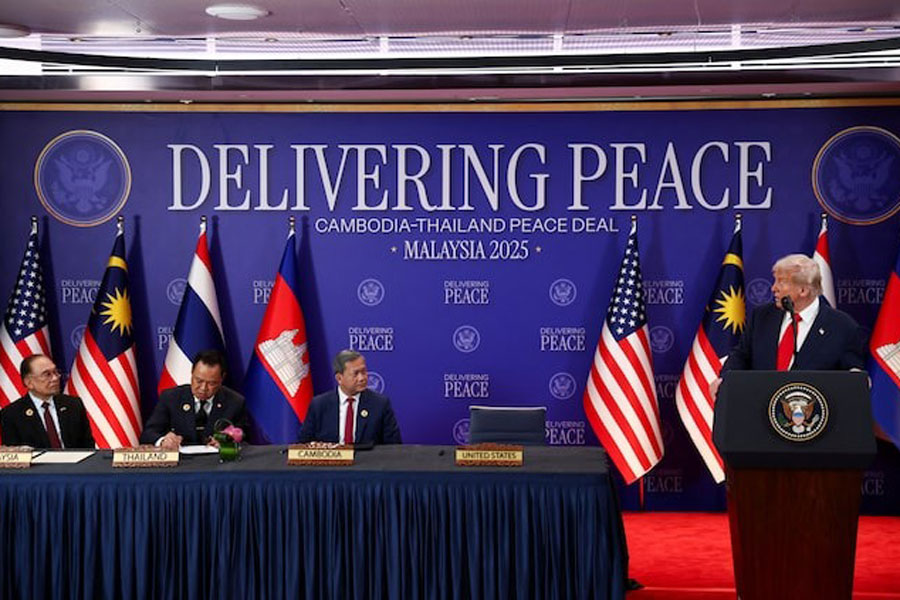 Malaysia's Prime Minister Anwar Ibrahim, Thailand's Prime Minister Anutin Charnvirakul and Cambodia’s Prime Minister Hun Manet look on as US President Donald Trump speaks ahead of the signing of a ceasefire deal between Cambodia and Thailand on the sidelines of the 47th Association of Southeast Asian Nations (ASEAN) summit in Kuala Lumpur, Malaysia, October 26, 2025.