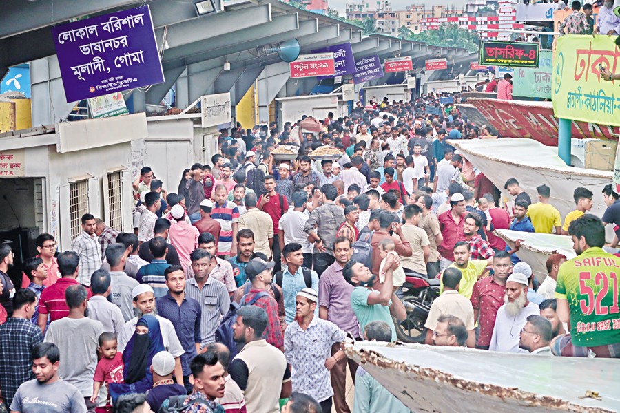 An overwhelming crowd of passengers at Sadarghat Launch Terminal in the city on Monday during departure for their native homes to celebrate Eid-ul-Azha — FE Photo