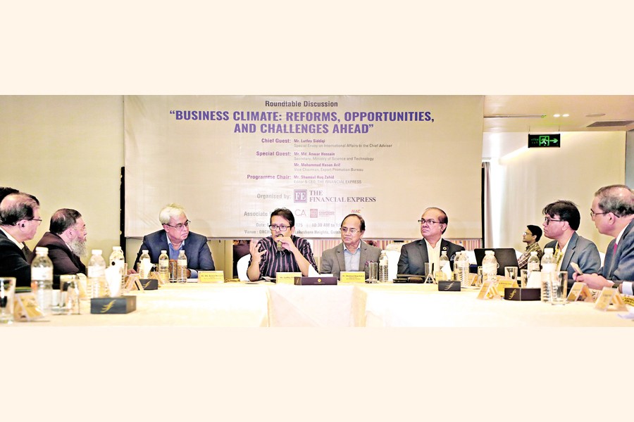Lutfey Siddiqi, Special Envoy on International Affairs to the Chief Adviser, speaks at a roundtable discussion titled 'Business Climate: Reforms, Opportunities, and Challenges Ahead', organised by The Financial Express at a city hotel on Monday — FE photo