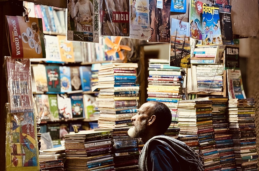 Looking for books at the Kamlapur Railway Station