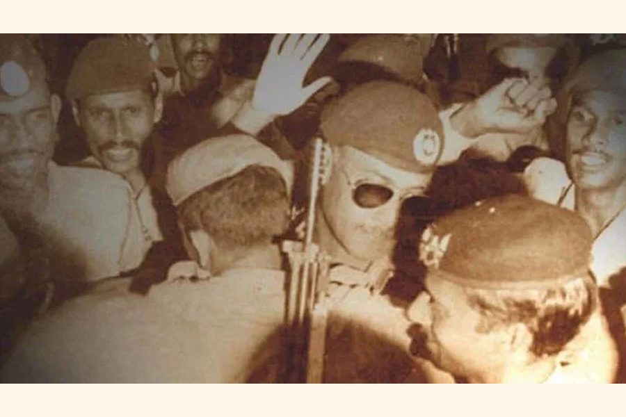 General Ziaur Rahman (in the middle) among soldiers after freed from house arrest on November 7, 1975 —collected Photo