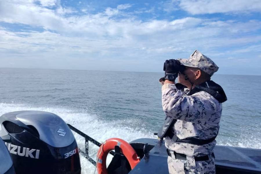 A staff member of the Malaysian Maritime Enforcement Agency searches for victims of a boat from Buthidaung, Myanmar, that sank near the Malaysia–Thailand border, during a search and rescue operation close to Langkawi, Malaysia November 9, 2025.