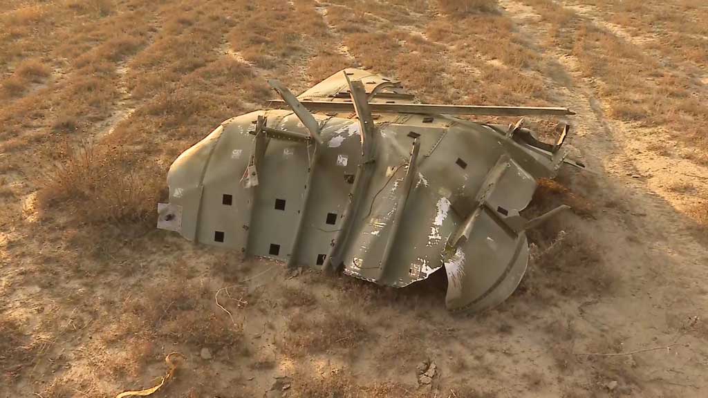 Wreckage lies at the site of the Turkish C-130 military cargo plane crash near the Azerbaijani border, in Sighnaghi municipality, Georgia, Nov 11, 2025, in this still image taken from video. REUTERS