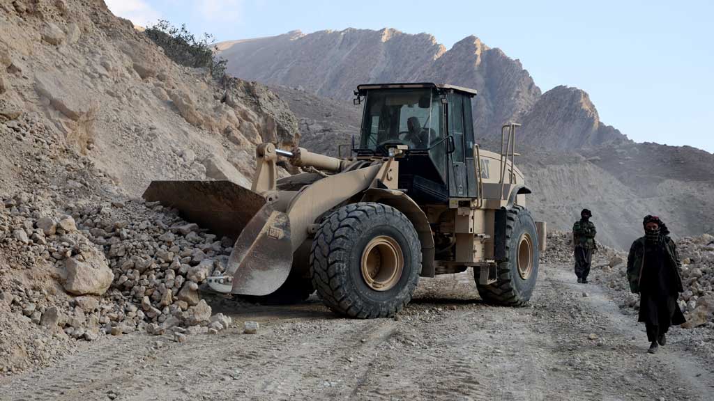 An excavator clears a road following a recent earthquake in Marmul district in Balkh province, Afghanistan, Nov 5, 2025. REUTERS