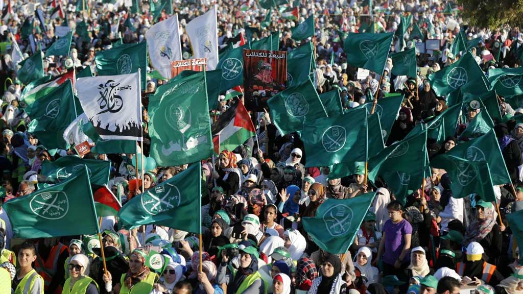 Supporters of the Muslim Brotherhood conduct a march in Jordan. Photo: Reuters