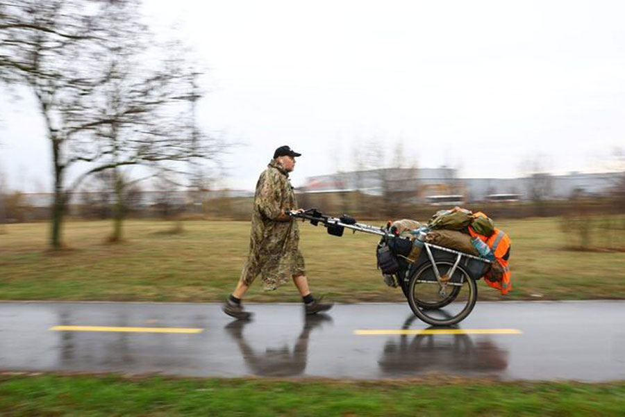 British ex-paratrooper Karl Bushby, who has been walking across the world for 27 years, walks in Komarom, Hungary, November 25, 2025.