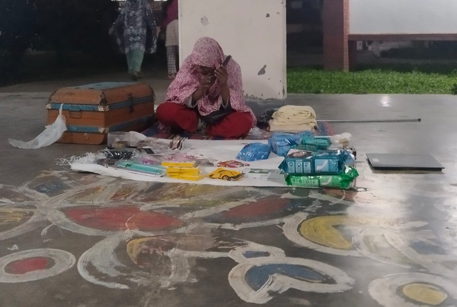 Shilpi with her suitcase selling products at Ruqayyah Hall of the University of Dhaka