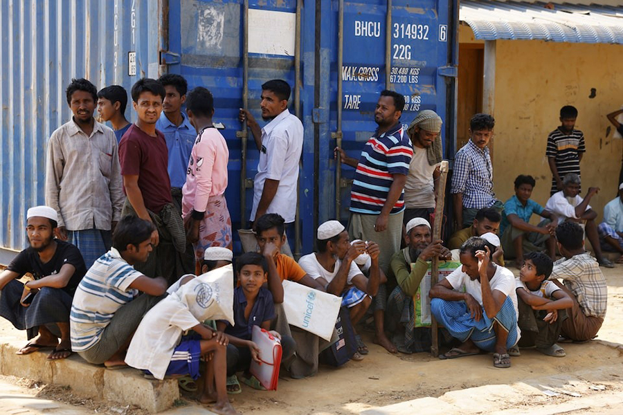 Rohingya refugees wait for relief supplies during Ramadan, at the Rohingya refugee camp in Cox's Bazar, Bangladesh on March 16, 2025 — Reuters/File