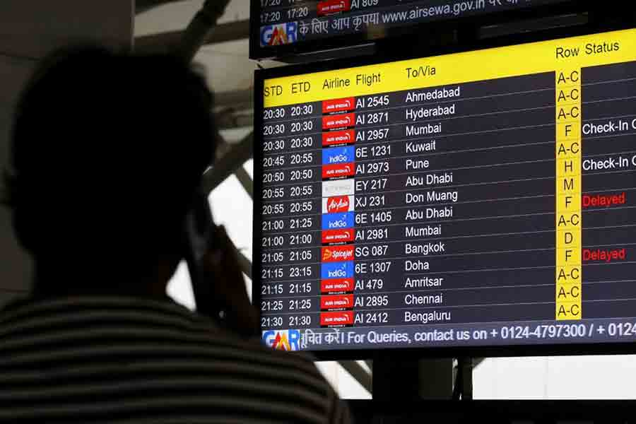 A screen displays delays in IndiGo flights at the Indira Gandhi International Airport in Delhi, India, Nov 29, 2025.