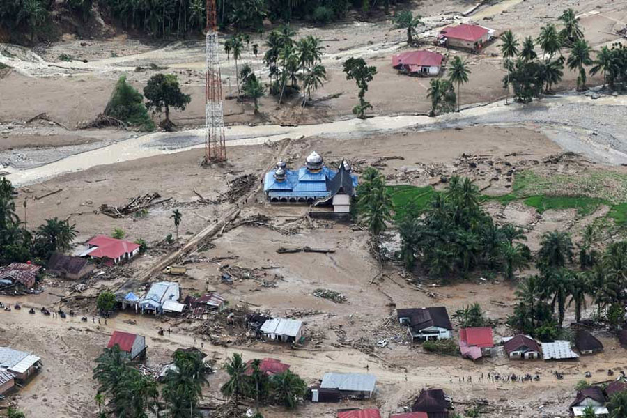 A mosque stands in an area hit by deadly flash floods in Palembayan, Agam regency, West Sumatra province, Indonesia, Nov 30, 2025.