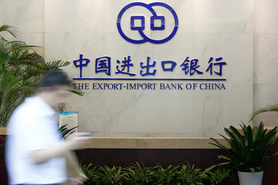 A man walks past the lobby of the Export-Import Bank of China (EXIM) headquarters in Beijing, China on June 13, 2017 — Reuters/File