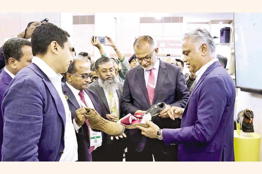 Commerce Adviser Sheikh Bashir Uddin visits a stall after inaugurating Global Sourcing Expo-2025 at Bangladesh-China Friendship Exhibition Center in Purbachal on Monday. —PID