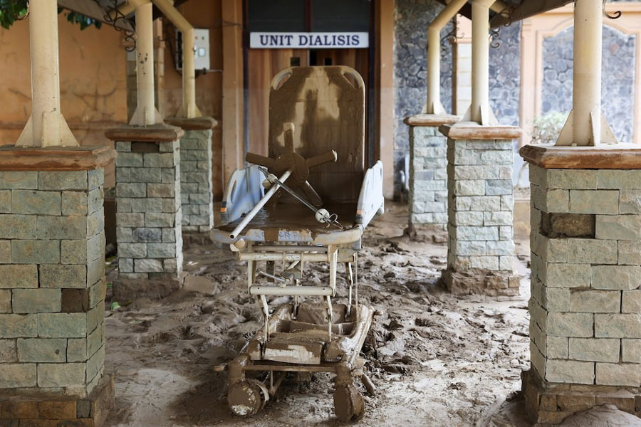 A mud-covered stretcher sits inside the damaged Aceh Tamiang Regional Hospital after a deadly flash flood triggered by heavy rains in Karang Baru, Aceh Province, Indonesia, December 7, 2025.