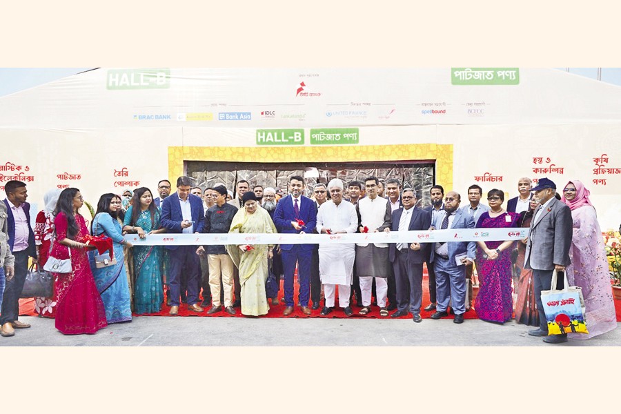Industries Adviser Adilur Rahman Khan inaugurates the 12th National SME Product Fair at the Bangladesh-China Friendship Conference Center in Agargaon on Sunday.