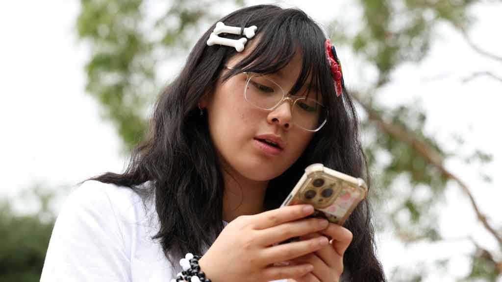 Annie Wang, 14, poses after an interview discussing Australia’s social media ban for users under 16, which is scheduled to take effect on Dec 10, in Sydney, Australia, Nov 22, 2025. REUTERS