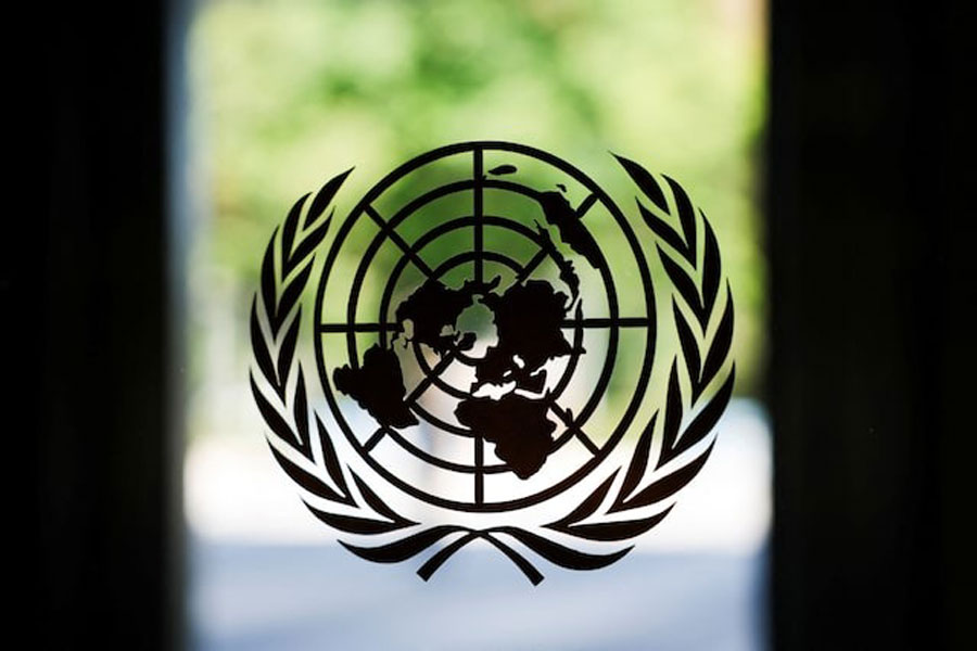 The United Nations logo adorns a window at UN headquarters in New York City, US, September 18, 2025.