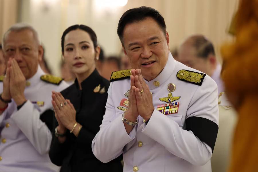 Thailand's Prime Minister Anutin Charnvirakul greets his cabinet on the day he speaks to members of the media to announce the dissolution of parliament at the Government House in Bangkok, Thailand, December 12, 2025.