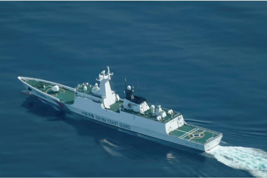 An aerial view of a China Coast Guard ship navigating near the disputed Scarborough Shoal, as Philippine Coast Guard aircraft carrying journalists patrols the area, days after two Chinese vessels collided in the area while allegedly trying to block a Philippine supply mission, in the South China Sea, August 13, 2025.