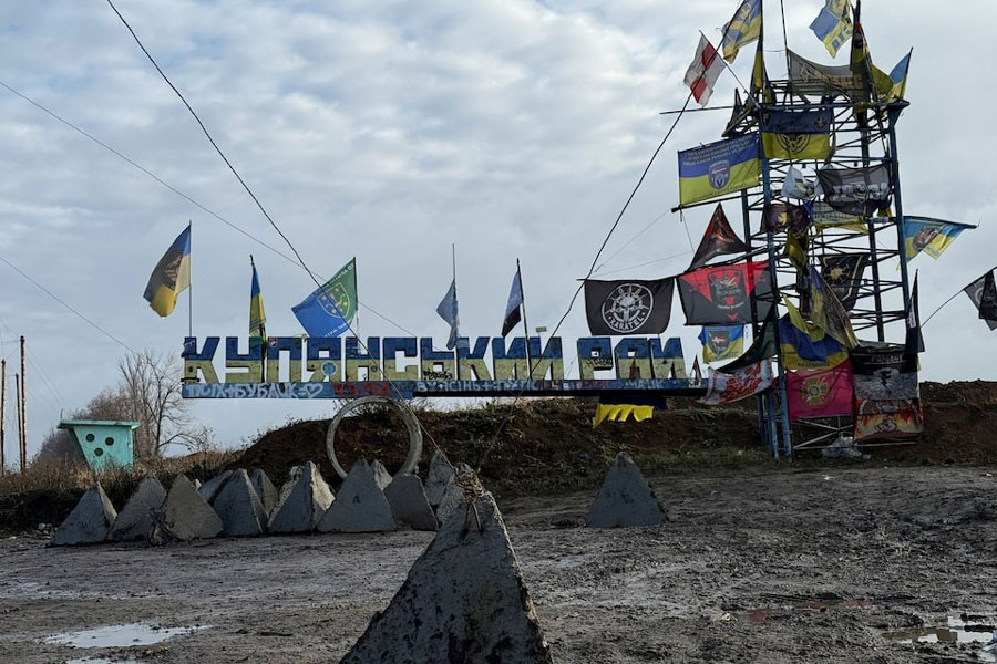 A road sign reads 'Kupiansk region’, amid Russia's attack on Ukraine, near the frontline town of Kupiansk, Ukraine November 12, 2025.