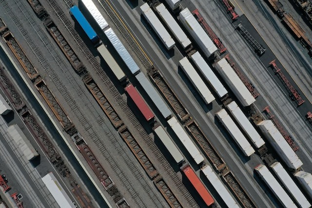 An aerial view of shipping containers and freight railway trains at the BNSF Los Angeles Intermodal Facility rail yard in Los Angeles, California, US, September 15, 2022.