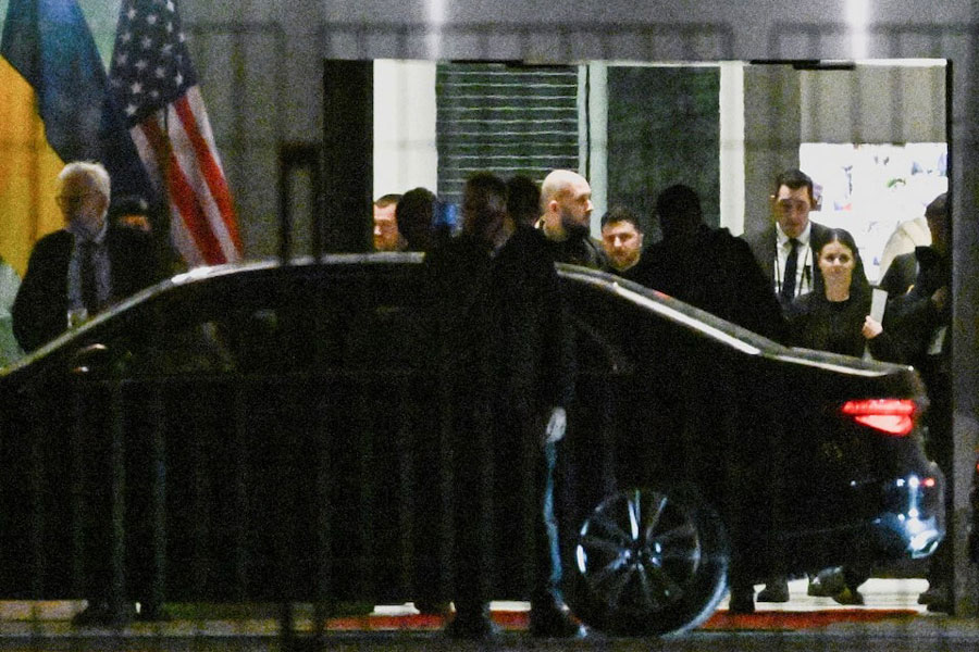 Ukraine's President Volodymyr Zelenskiy departs the Chancellery following talks with US envoy Steve Witkoff and US President Donald Trump's son-in-law Jared Kushner, hosted by German Chancellor Friedrich Merz in Berlin, Germany, December 14, 2025.