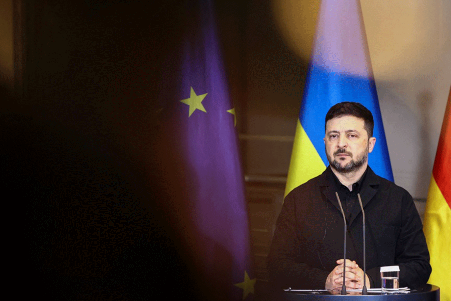 Ukrainian President Volodymyr Zelensky attends a press conference with German Chancellor Friedrich Merz (not pictured), at the Chancellery in Berlin, Germany Dec 15, 2025.