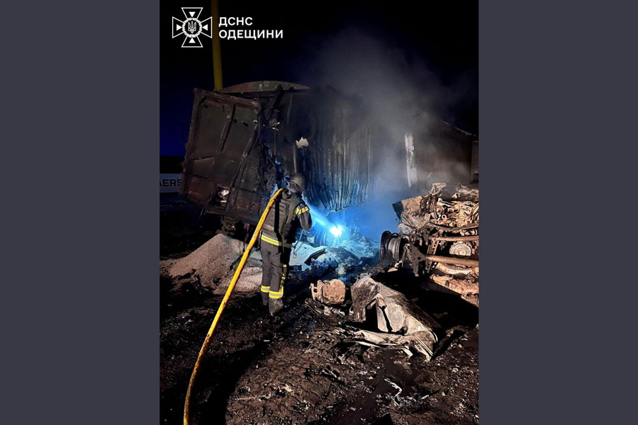 A firefighter works at the site of a Russian missile and drone strike, amid Russia's attack on Ukraine, in Odesa region, Ukraine in this handout picture released December 20, 2025.