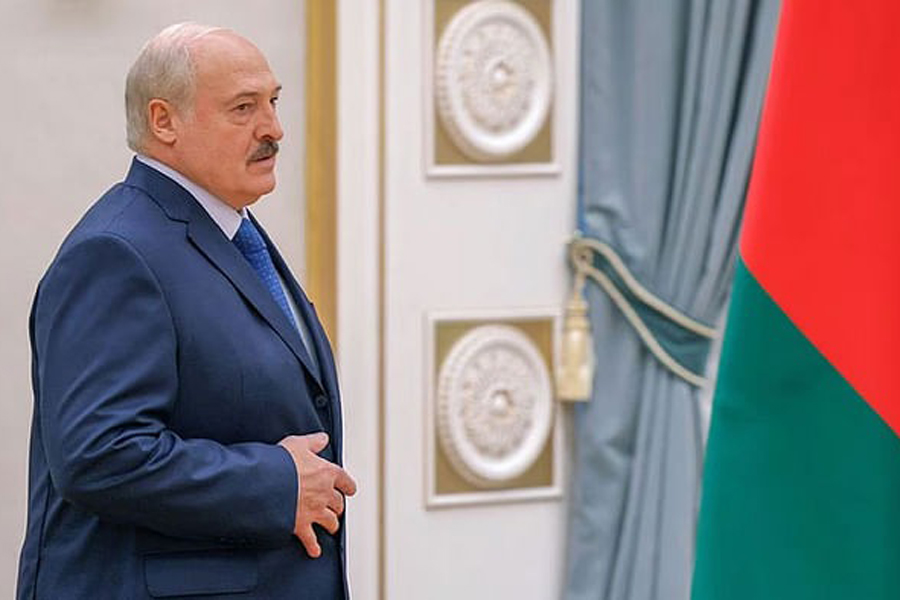 Belarusian President Alexander Lukashenko walks before a press conference in Minsk, Belarus Jul 6, 2023.