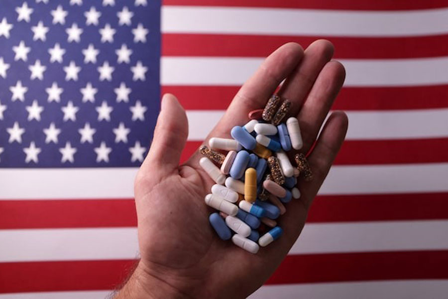US flag and medicines are seen in this illustration taken, June 27, 2024.