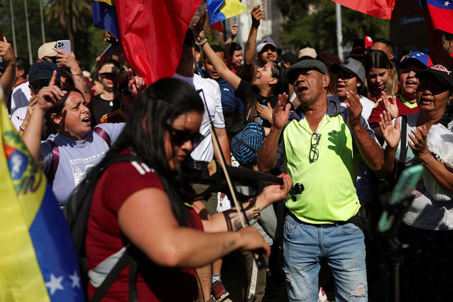 Venezuelans gather to celebrate, after US President Donald Trump said that the US attacked Venezuela and deposed its President Nicolas Maduro, in Santiago, Chile Jan 3, 2026.