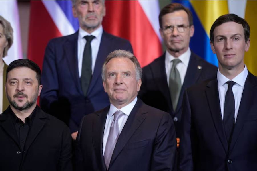 Ukraine's President Volodymyr Zelenskiy, Steve Witkoff, special envoy of the United States, and Jared Kushner stand together at the Chancellery in Berlin, Germany, December 15, 2025.