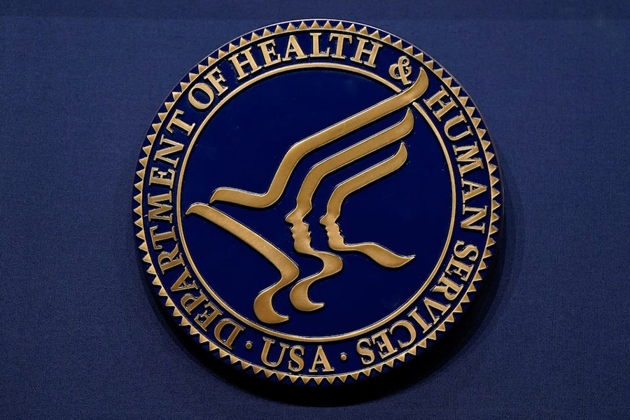 The seal of the US Department of Health and Human Services (HHS) adorns a lectern during a press conference in Washington, DC, US, on April 16, 2025 — Reuters/File