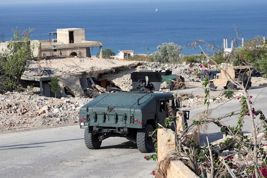 Lebanese army members drive military vehicles during a Lebanese army media tour, to review the army's operations in the southern Litani sector, in Naqoura, near the border with Israel, southern Lebanon, November 28, 2025.