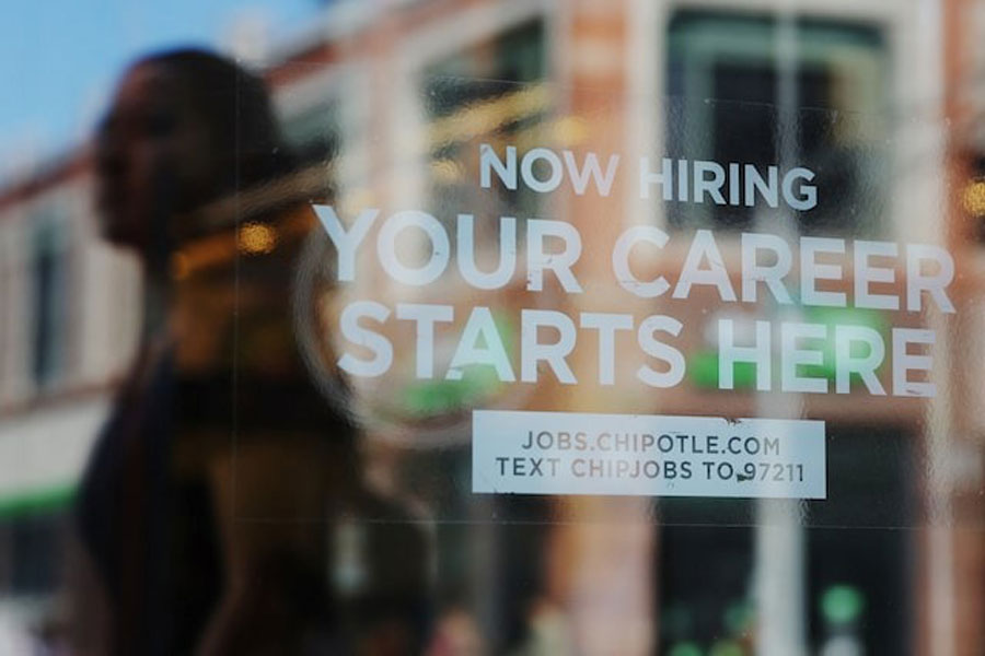 A Chipotle restaurant advertises it is hiring in Cambridge, Massachusetts, US, August 28, 2023.