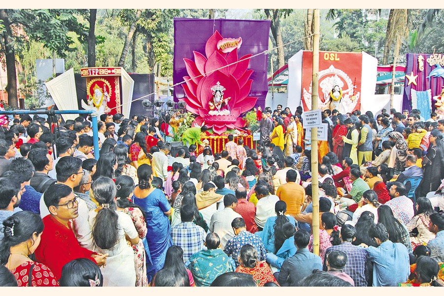 Hindu devotees and visitors thronged the Jagannath Hall, Dhaka University on Friday to celebrate the Saraswati Puja with great enthusiasm. — Focus Bangla