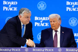 President Donald Trump shakes hands with Prime Minister of Hungary Viktor Orban, left, during a signing ceremony on his Board of Peace initiative at the Annual Meeting of the World Economic Forum in Davos, Switzerland, Thursday, Jan. 22, 2026. (AP Photo/Markus Schreiber, File)