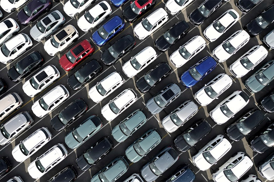 A drone view shows new cars parked, imported or waiting to be exported, in the port of Zeebrugge, Belgium on July 18, 2025 — Reuters/File