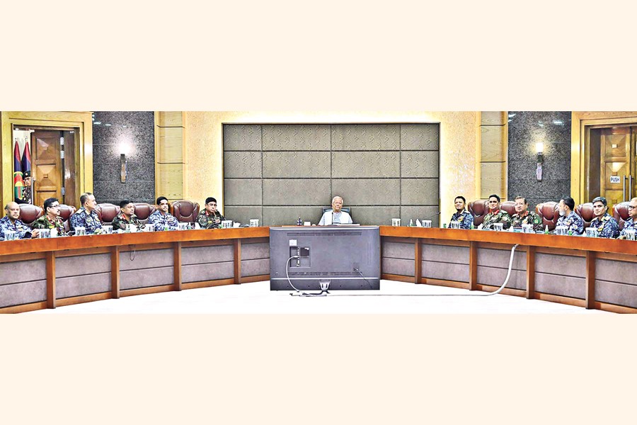 CA Prof Muhammad Yunus addresses a views-exchange meeting with senior armed forces officers at Army Headquarters in the capital on Monday. — PID