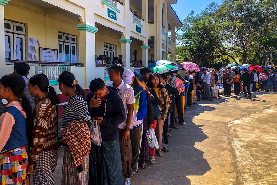 People queue to cast their votes at a polling station during Myanmar's general election in Naypyitaw, Myanmar, on December 28, 2025 — Retuers/File