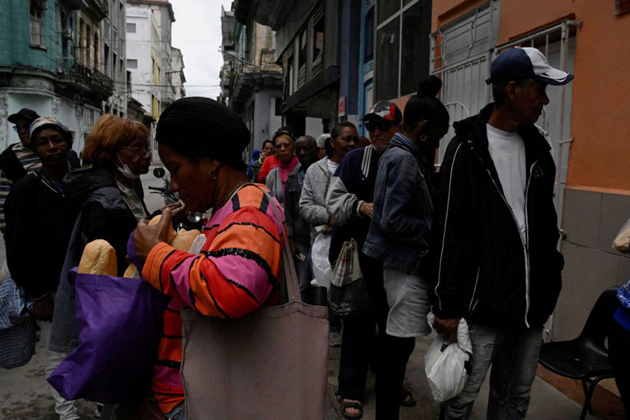 People line up to buy bread in Havana, as Cubans from all walks of life hunker into survival mode amid prolonged blackouts and soaring prices for food, fuel and transport, while the United States increases pressure on the communist‑run nation, in Cuba, Jan 30, 2026.