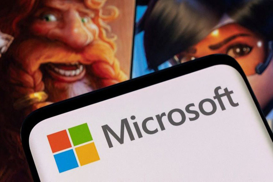 Microsoft logo is seen on a smartphone placed on displayed Activision Blizzard's games characters in this illustration taken on January 18, 2022 — Reuters illustration/Files