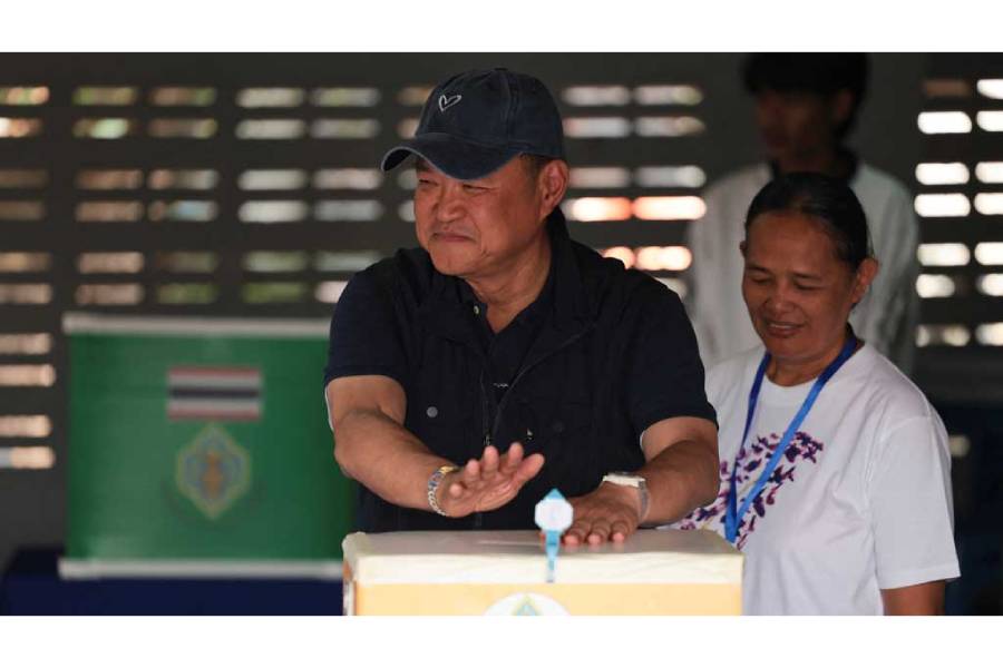 Thailand’s caretaker Prime Minister Anutin Charnvirakul, Bhumjaithai Party leader and prime ministerial candidate, votes in a referendum to decide if a new constitution should replace a 2017 charter, a military-backed document that critics say concentrated power in undemocratic institutions, at a polling station in Buriram province, Thailand, Feb 8, 2026.