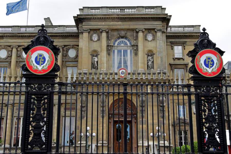 Flags fly from the roof of France's Foreign and European Affairs Ministry, called the Quai d'Orsay, in Paris August 18, 2010.