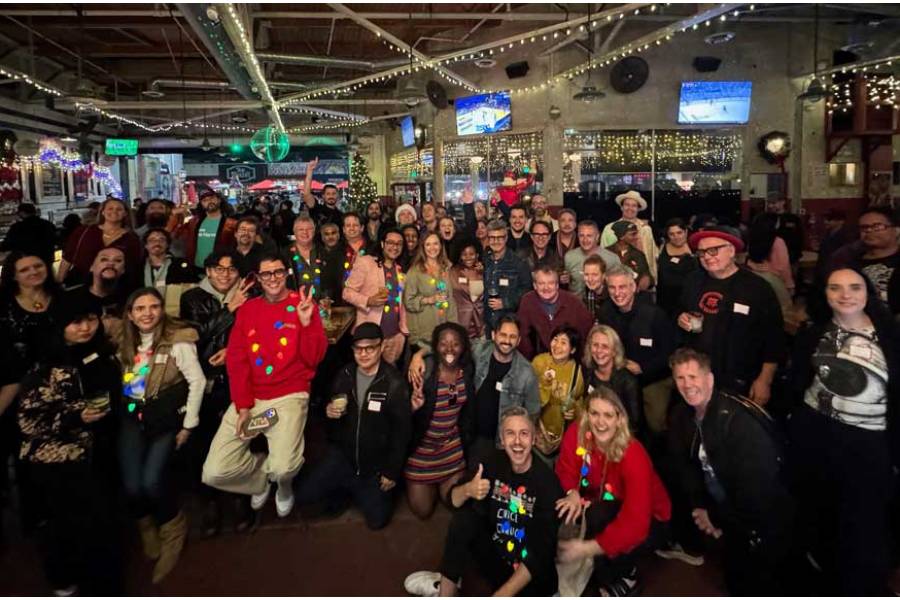 People attend a Curious Refuge Christmas party in Los Angeles, California, US, in this undated handout image.
